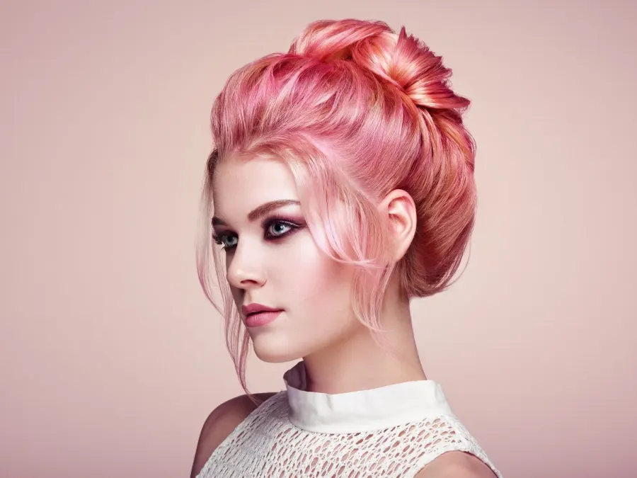 Model with a sculpted pink updo