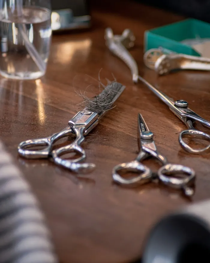 Professional shears and combs on a station